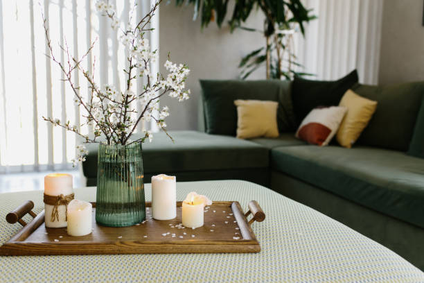 istock Home interior. Relaxing candles. Apple tree color has flown. Blurred background 1301733020