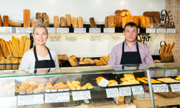 istock Bakers working in family bakery 1301734690