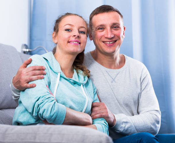 istock Couple enjoying evening at home 1301734725
