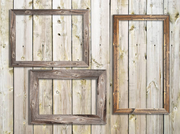 istock Old wooden frames on wooden background 1301735359