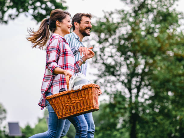 istock Couple going on a picnic in nature 1301737148