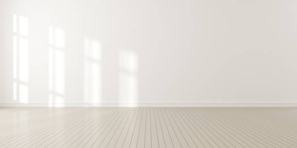 istock 3d render of modern empty room with wooden floor and large white plain wall. 1301739174