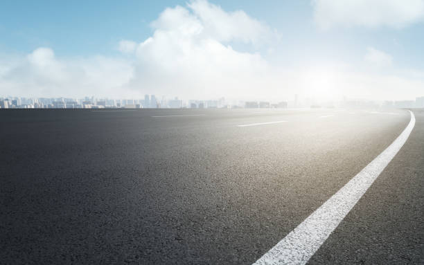 istock Asphalt highway skyline and modern building landscape 1301745138