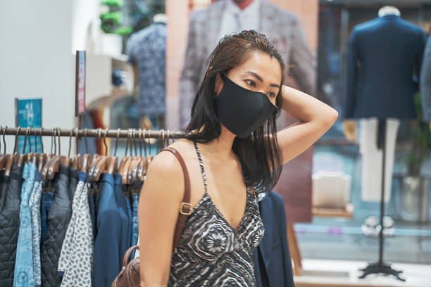 istock Shopping with protective face mask, New normal 1301746361