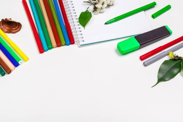 istock paper and colorful felt tip pens on the white table 1301752509