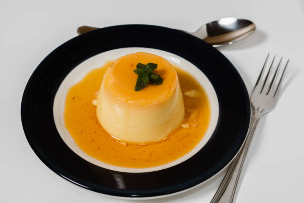 istock Delicious typical dessert from South America called Flan, made with eggs, milk, vanilla and flavored with caramel. 1301754309