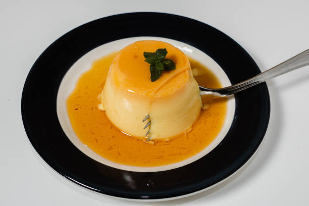 istock Delicious typical dessert from South America called Flan, made with eggs, milk, vanilla and flavored with caramel. 1301754430