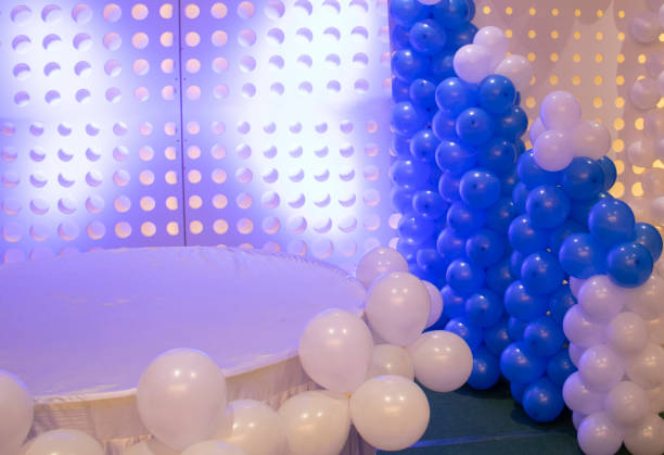 istock PARTY BIRTHDAY EVENT BALLOON STAGE DECORATION WITH EMPTY BANNER 1301756241
