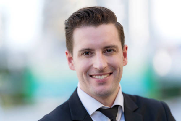 istock Close up of Smiling businessman 1301756475