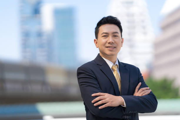 istock Close up of Smiling businessman 1301756483