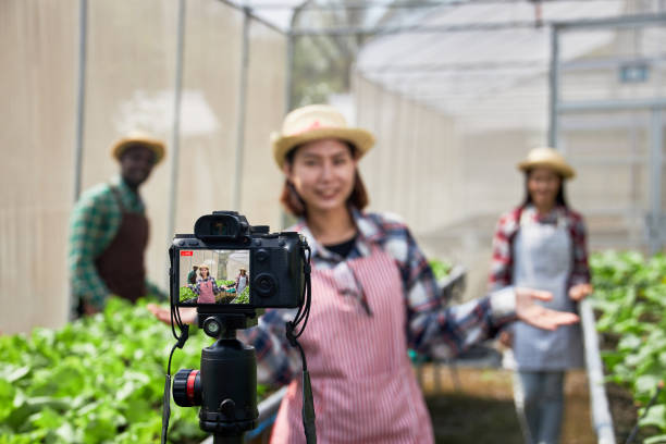 Young creative influencer an online streaming farming demonstration.