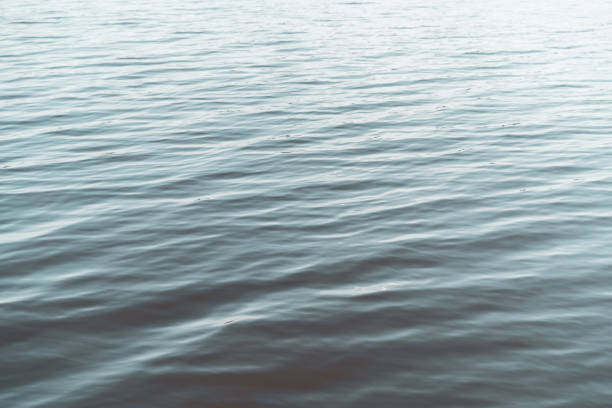 istock Copy space of surface wave water texture abstract background. Vintage tone filter color style. 1301757946