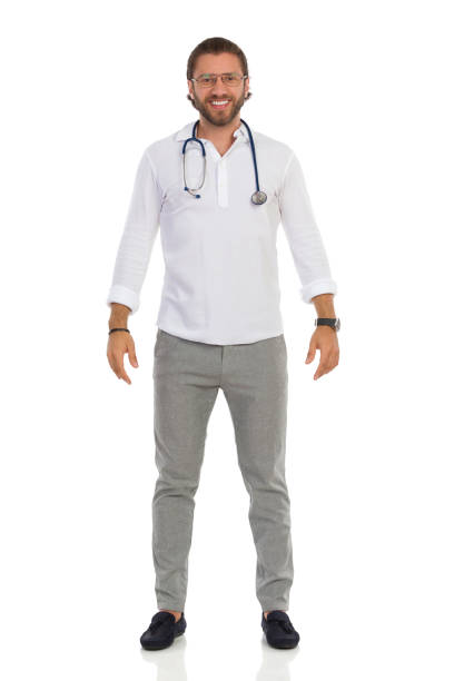 istock Smiling Handsome Male Doctor Is Standing Relaxed. Front View. 1301759070