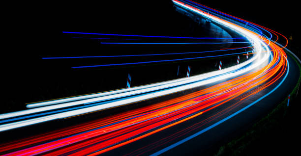 istock lights of cars with night. long exposure 1301760141