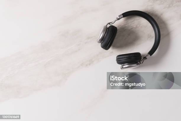 Wireless Headphones With Touch Controls Isolated On White Background Stock Photo - Download Image Now