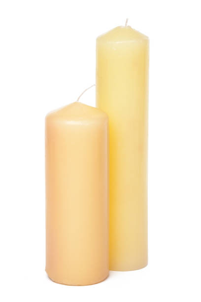istock Wax colored candle isolated on white background close up 1301763329