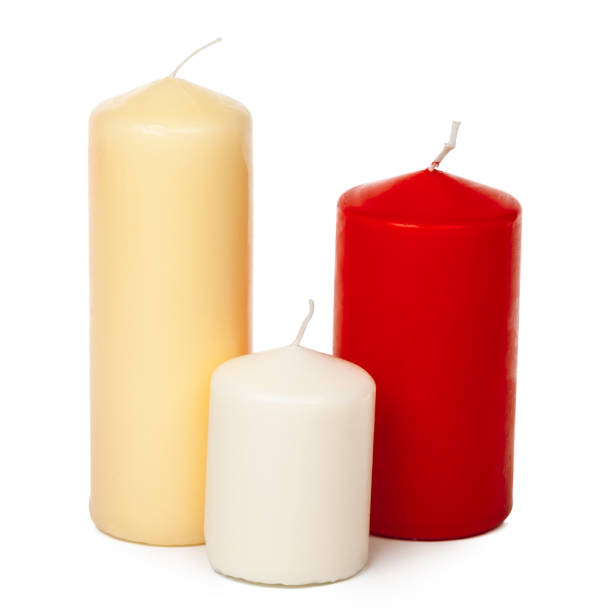 istock Red and white colored xmas candles isolated on white background 1301763986