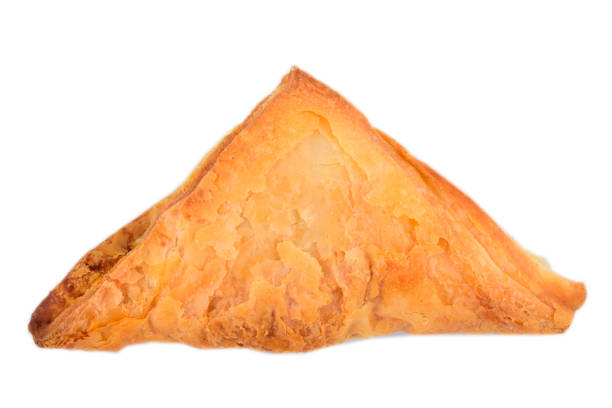istock triangle veg puff isolated on white background with clipping path 1301763993