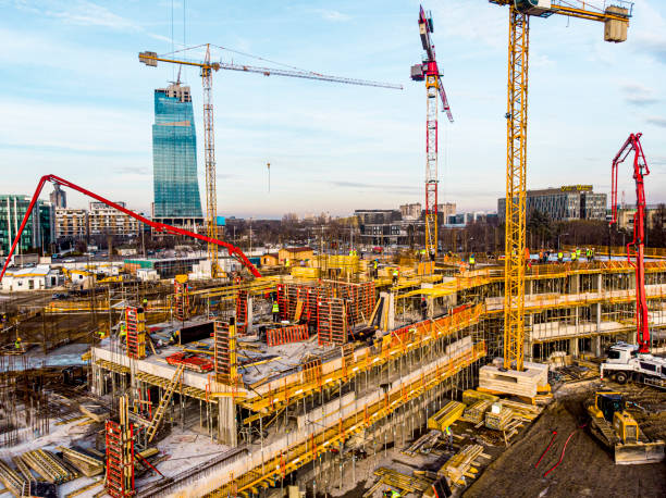 istock High angle view of workers in construction site stock photo 1301768468