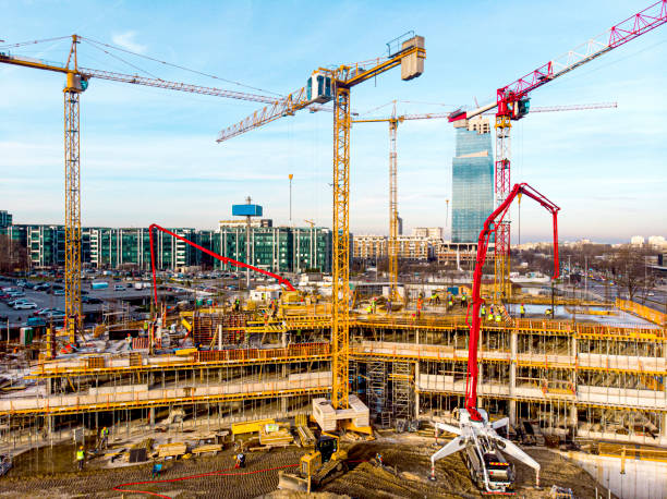 istock High angle view of workers in construction site stock photo 1301768487