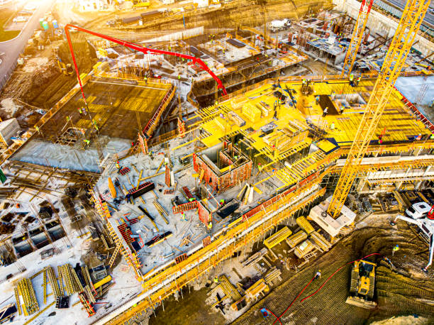istock High angle view of workers in construction site stock photo 1301768584