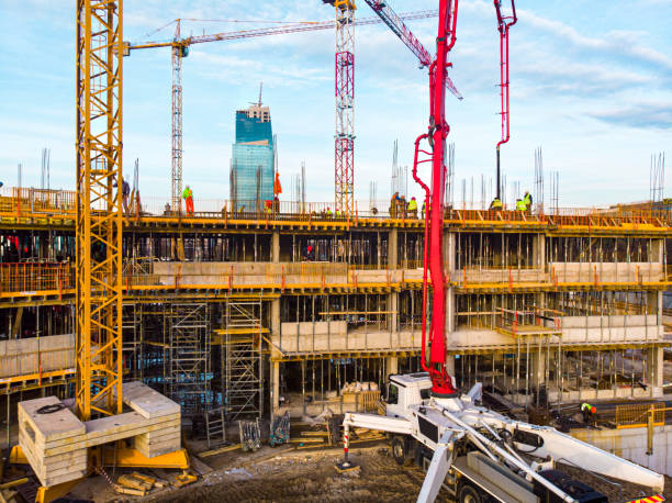 istock High angle view of workers in construction site stock photo 1301768634