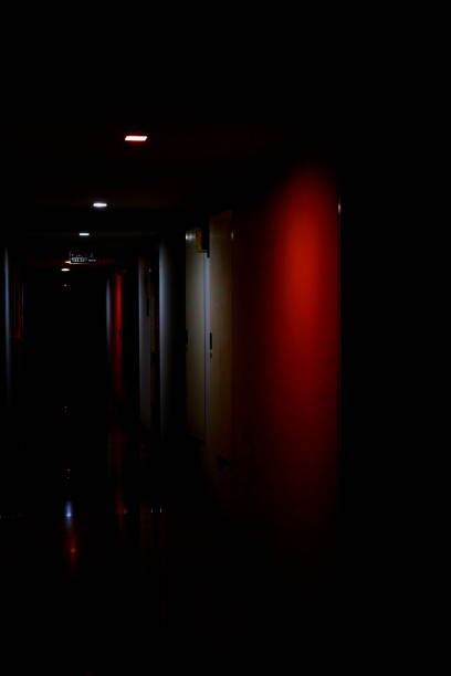 istock Dark corridor of condo at night 1301771259