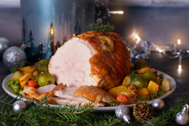 istock Roasted turkey breast. Christmas dinner table 1301771442