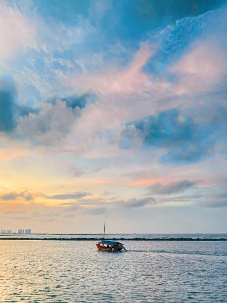 istock a boat under the sky, above the sea 1301772561