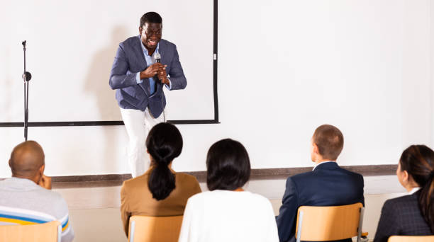 istock Young emotional male coach giving motivational speech 1301772976