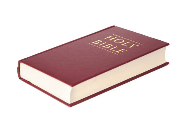 istock Holy Bible book, isolated on white 1301773253
