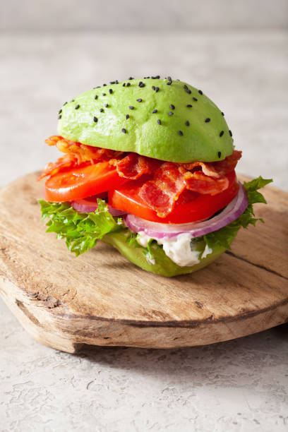 istock keto paleo diet avocado burger with bacon, lettuce, tomato 1301773274