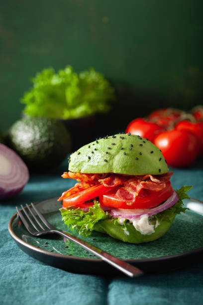 istock keto paleo diet avocado burger with bacon, lettuce, tomato 1301773343