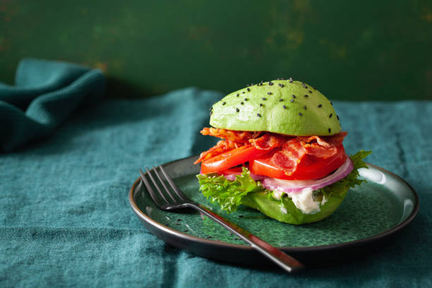 istock keto paleo diet avocado burger with bacon, lettuce, tomato 1301773935