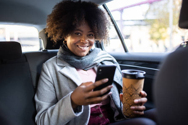 istock Businesswoman to work traveling by cab 1301774189