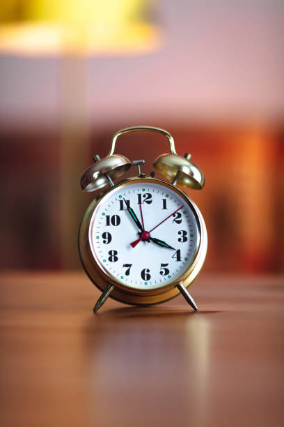 istock old gold alarm clock - 4 O'Clock 1301777070