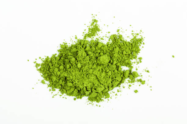 istock Top view green matcha tea powder isolated on white background 1301777093