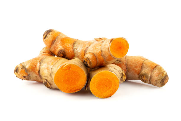 istock Turmeric powder and turmeric root isolated on white background ,Top view 1301777131