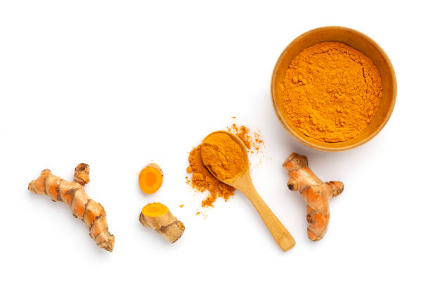 istock Turmeric powder and turmeric root isolated on white background ,Top view 1301777152