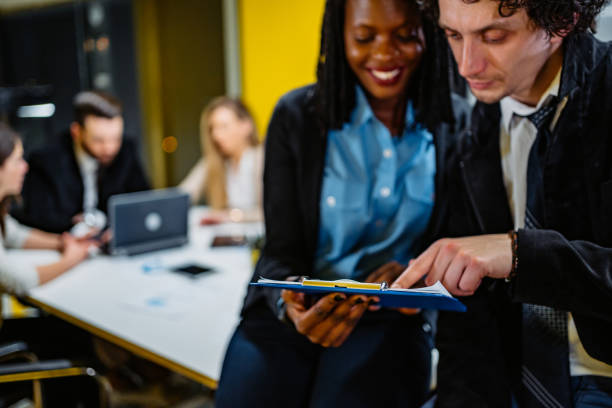 istock Young people at business meeting 1301778336