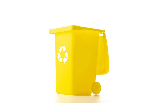 Bin icon. Container for disposal garbage waste and save environment. Yellow dustbin for recycle plastic trash isolated on white background