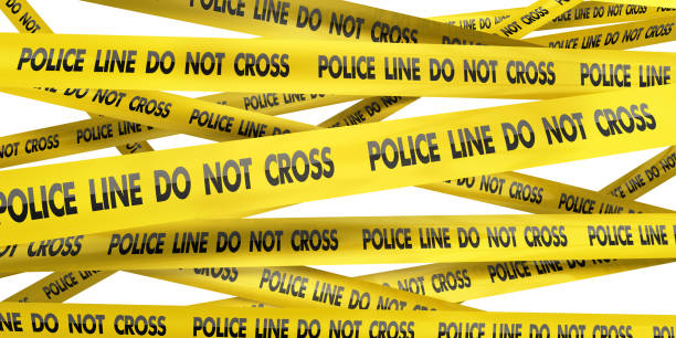 istock Police line do not cross Tape 1301779595