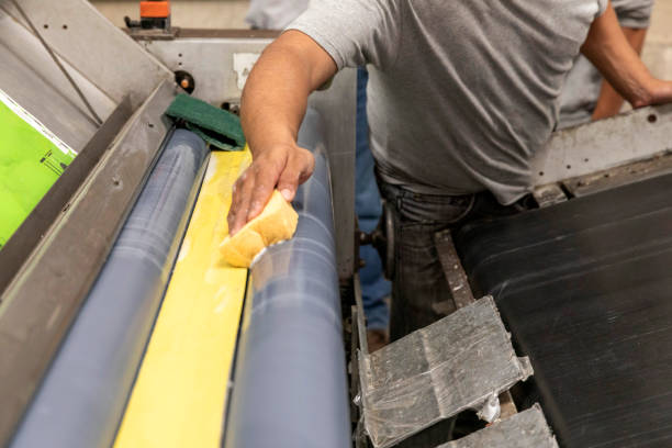 istock Closeup of an offset printing machine during production. 1301782473