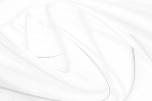 istock soft light and shadow fabric smooth abstract curve shape decorative modern fashion white and gray background 1301782816