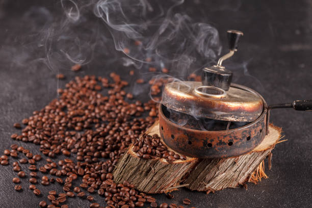 istock The device for roasting coffee beans, an old hand grinder. 1301784624