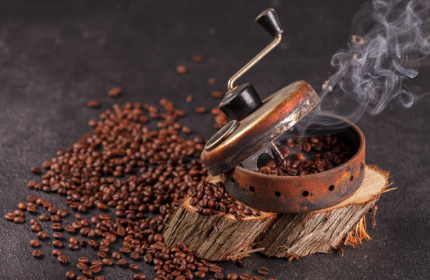 istock The device for roasting coffee beans, an old hand grinder. 1301784689