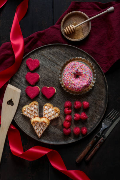 istock Love Breakfast plate for Valentines with Waffles and Sweets 1301785126