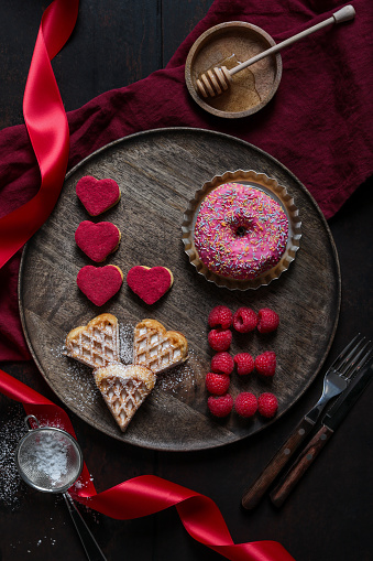 Love spelt out on Breakfast for Valentines with Waffles and Sweets