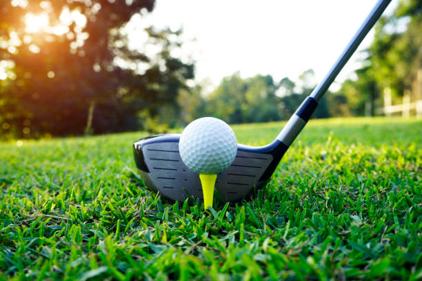 istock Golf ball and golf club 1301786150