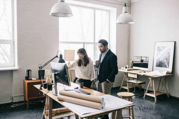 istock Architects having a meeting in their office 1301788739